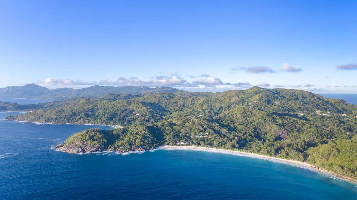 Anse Intendance beach and forested hills on Mahé, Seychelles