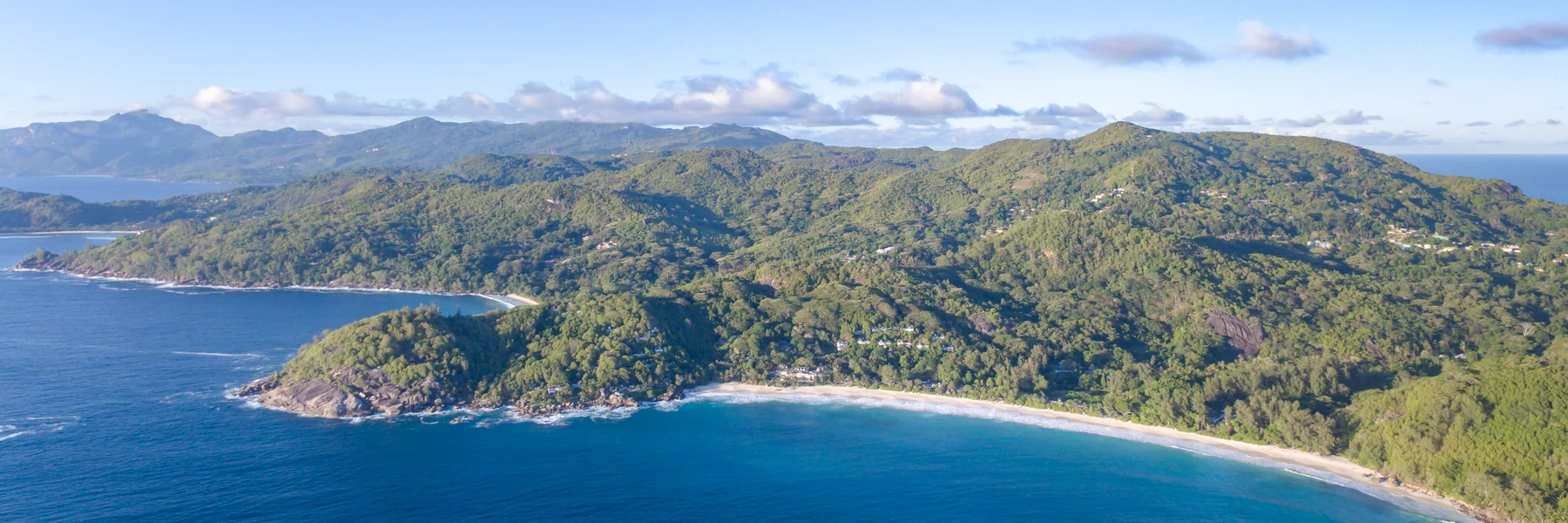 Anse Intendance beach and forested hills on Mahé, Seychelles